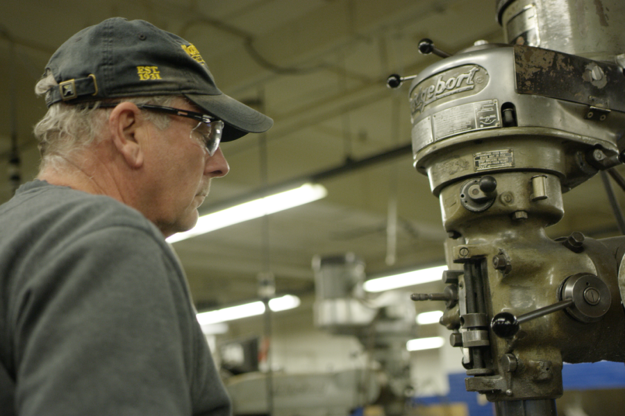 John Cislo in machine shop at Eastman